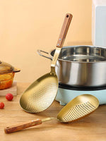 Escumadeira de Aço Inoxidável Dourada/Preta com Cabo de Madeira - Haustter - Haustter