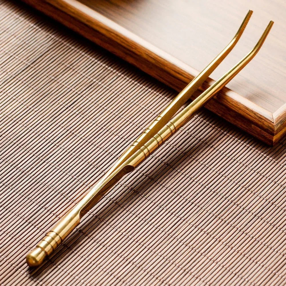 Pinça de chá em bronze